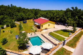 Sunny yellow house with a pool